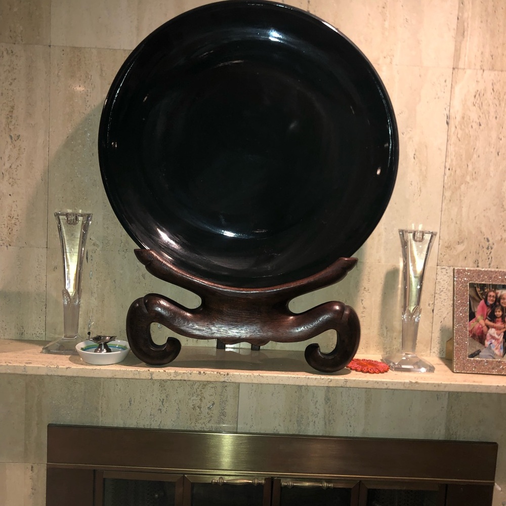 Round decorative plate with wooden stand - approx 20lbs in weight, 24” W x 29” L